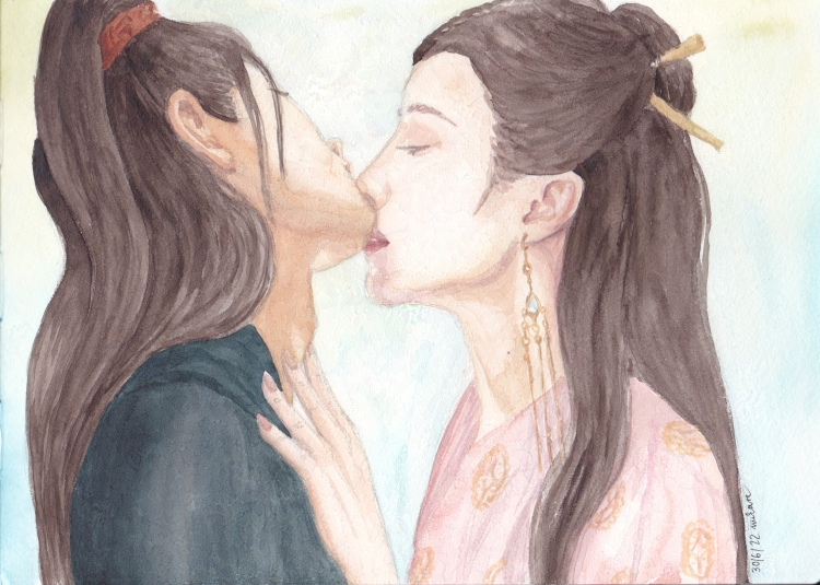 woman kissing a man's chin